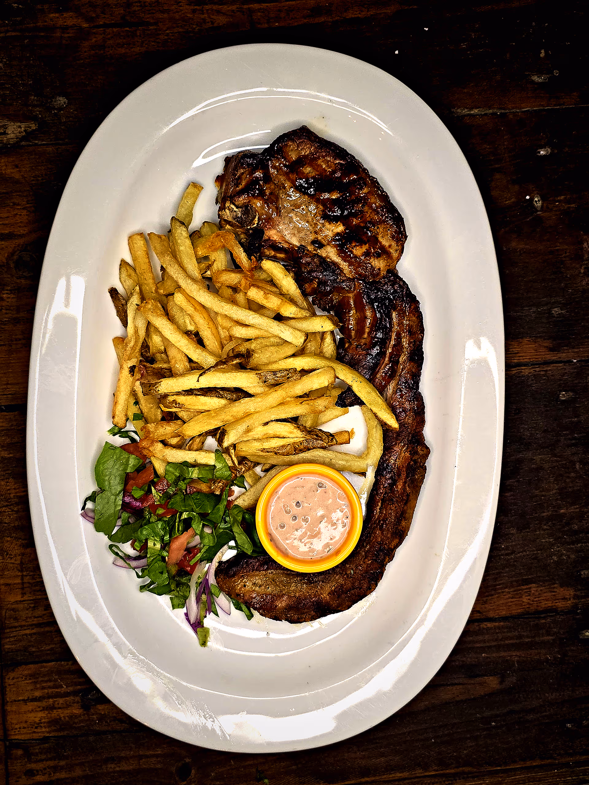 Tomahawk de porc & cartofi prăjiți