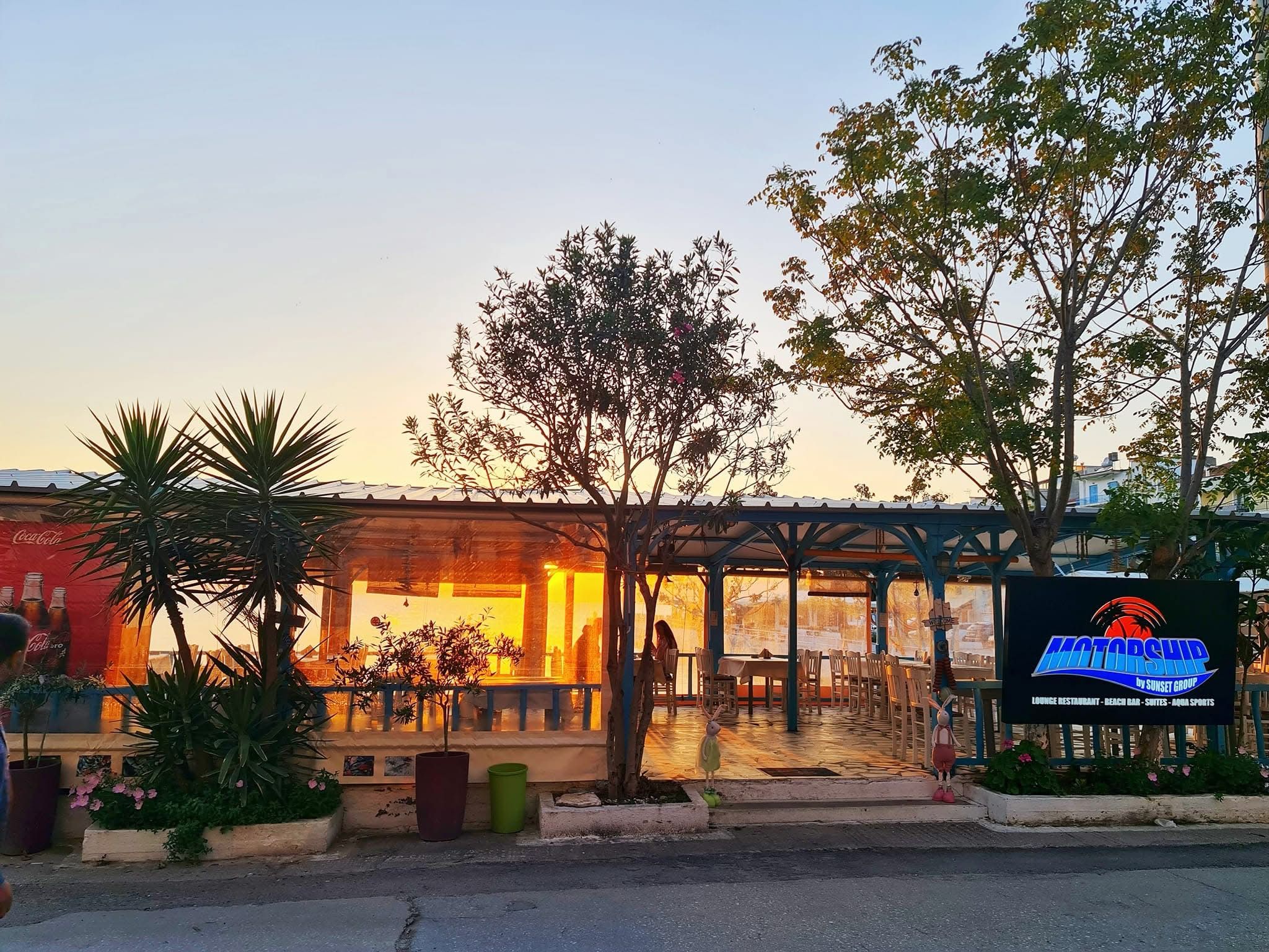 Taverna Motorship terrace at sunset